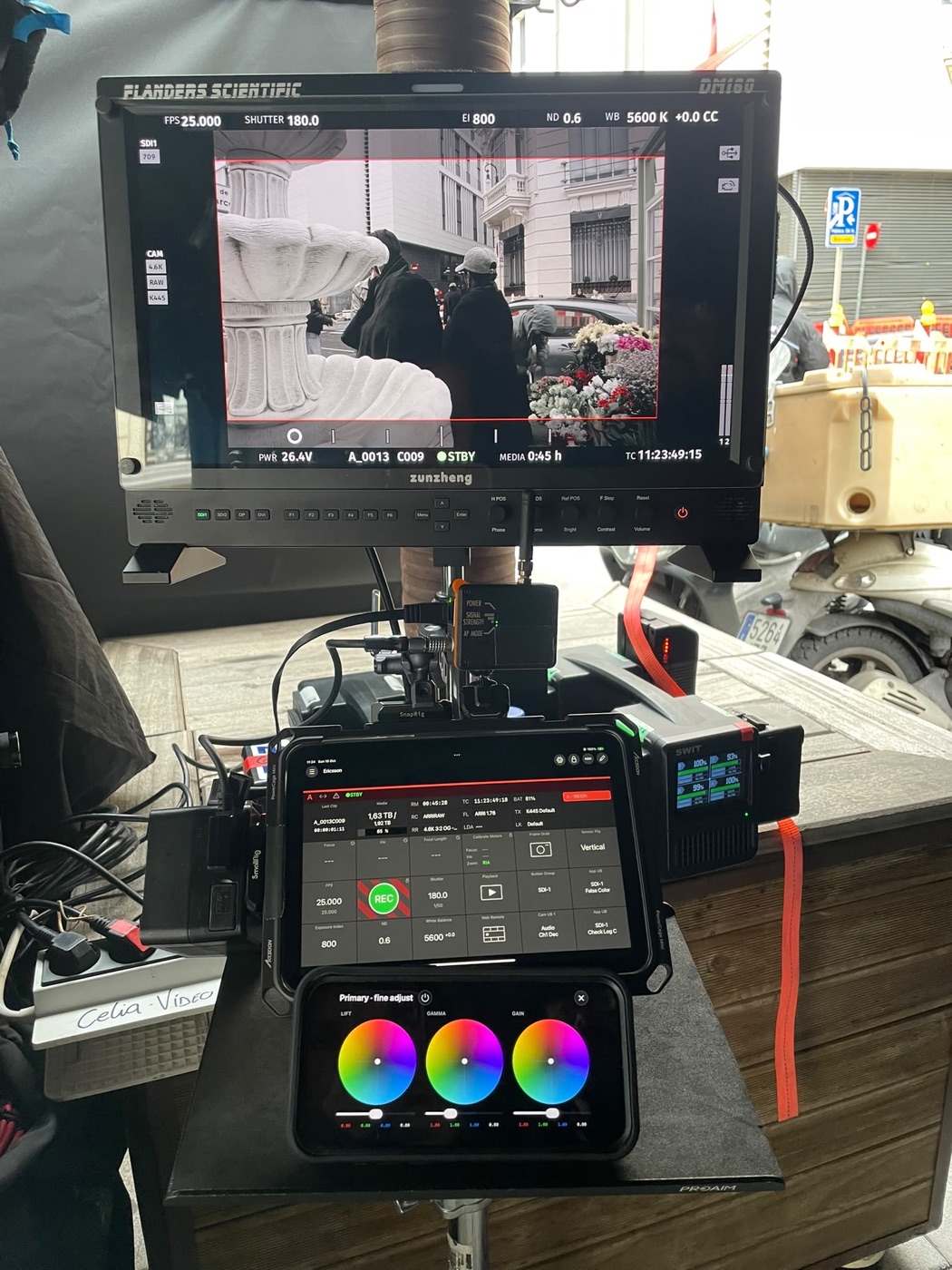 Inside the tent: DM160 on top, an iPad mini with camera control and an iPhone running GRADE color wheels underneath